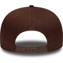 mutsid-lame-pruun-snapback-9fifty-original-fit-league-essential-new-york-yankees-mlb-new-era